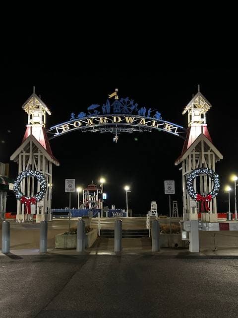 Christmas wreaths on OC Boardwalk archway