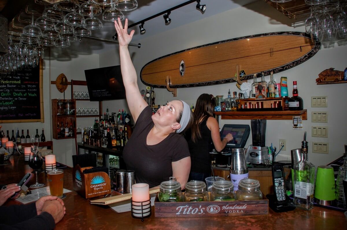 Morgan Fagan jumped behind the bar to help out as people started rolling in for Happy Hour.