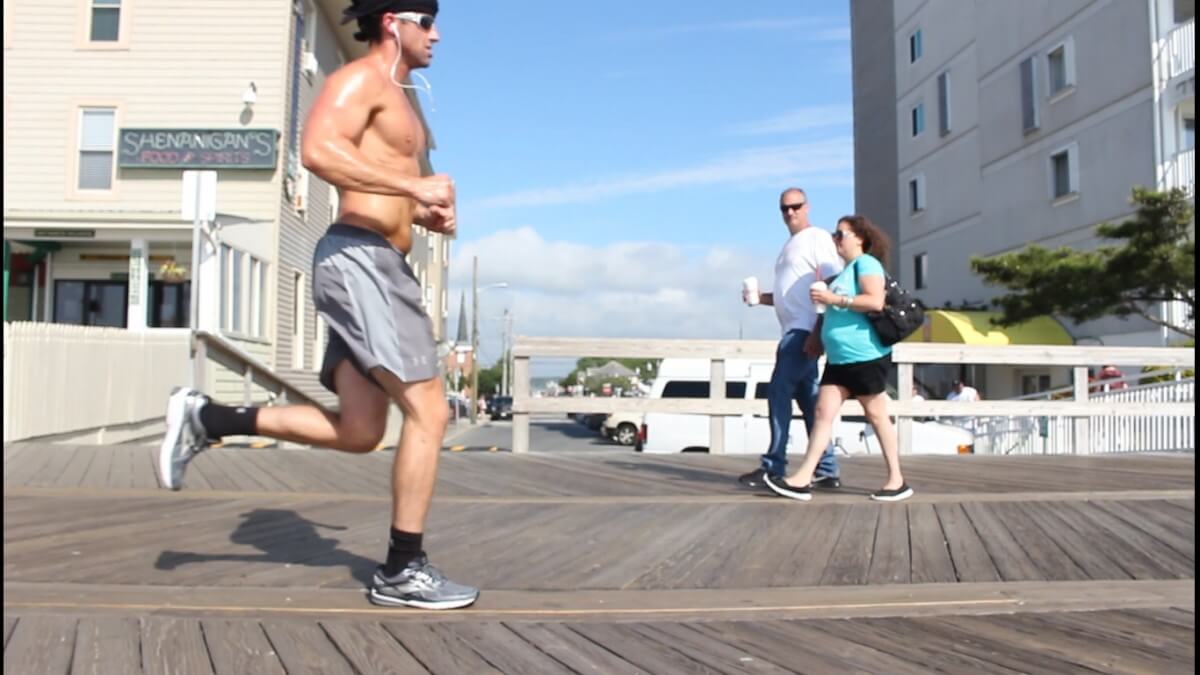 Shirtless running man