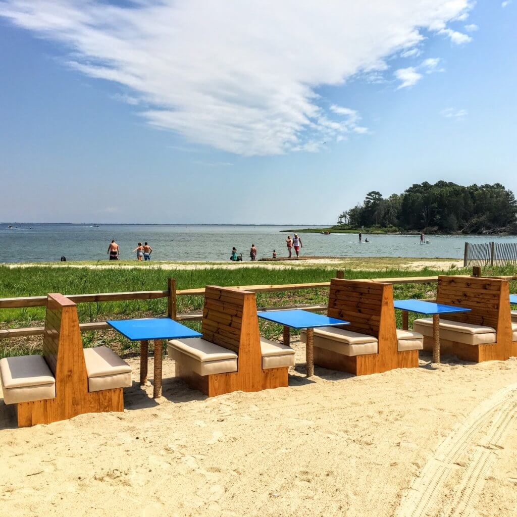beach seating at the sandy dollar bar and grill