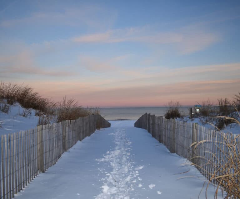 Snowy beach sunset