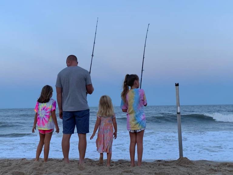 a family fishing in Ocean City MD