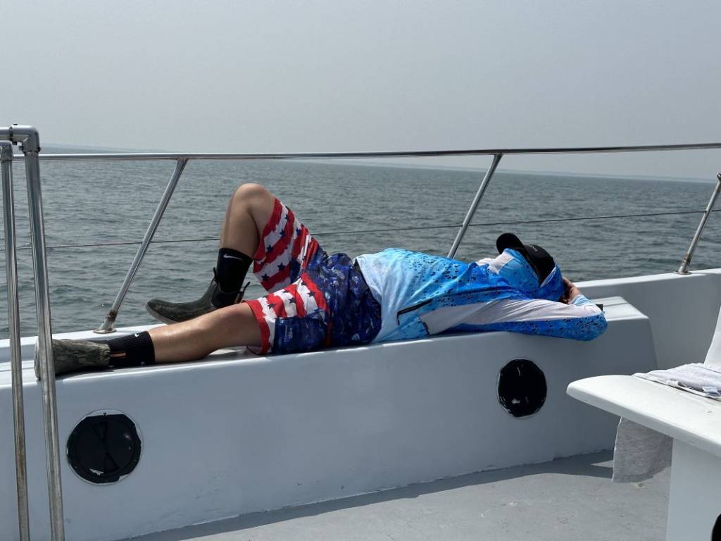 resting after limiting out aboard the Angler