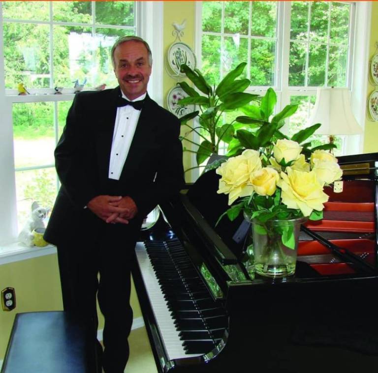Phil Perdue- The Piano Man at The Captain’s Table