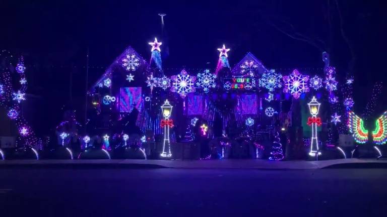 Christmas Lights and Community: The Caine Woods Christmas House 