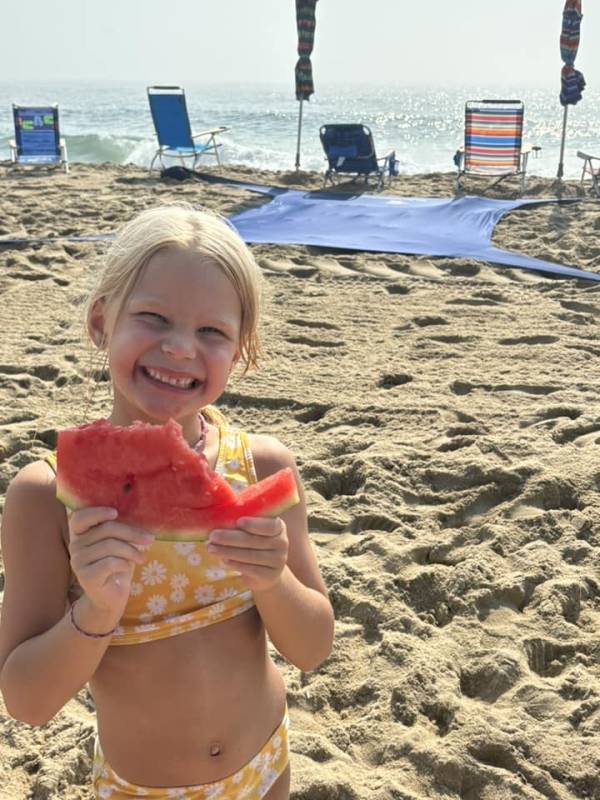 Eating Watermelon on the beach in Ocean City Md