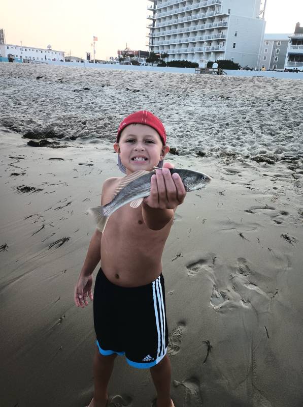 Boy with fish in Ocean City Md