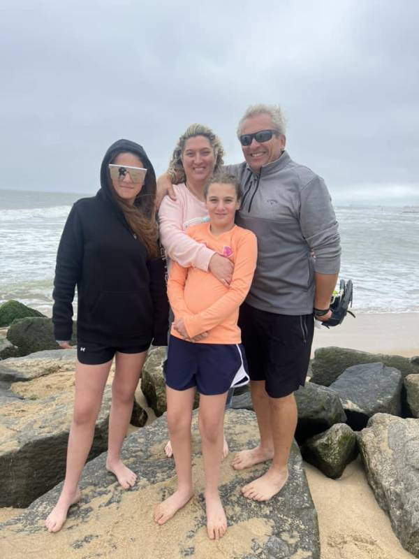 Family on the chilly beach in Ocean City Md