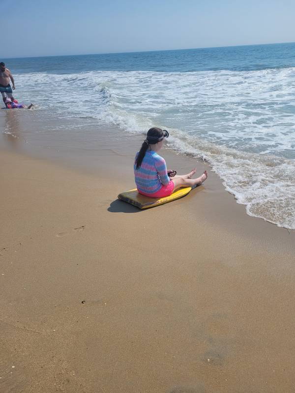 Girl on the beach in Ocean City Md