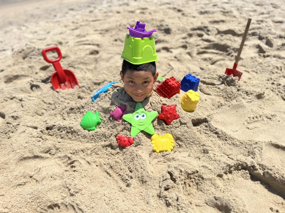 burried in the sand Ocean City Md