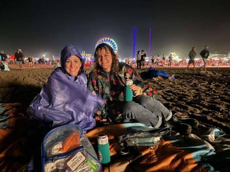 Some spectators didn't mind the rain that came through at Friday's Ocean's Calling 2024.