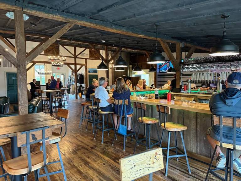 a large bar is front and center inside the new Berlin Beer Co in downtown Berlin MD