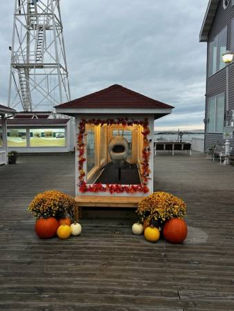 Halloween themed whale display on boardwalk