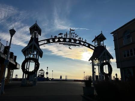 boardwalk archway with wreaths