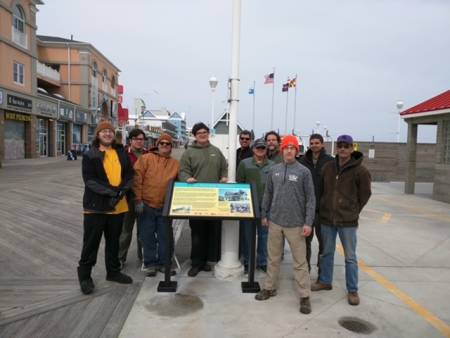Caroline St marker in 2016 with Will and fellow Boy Scouts and others