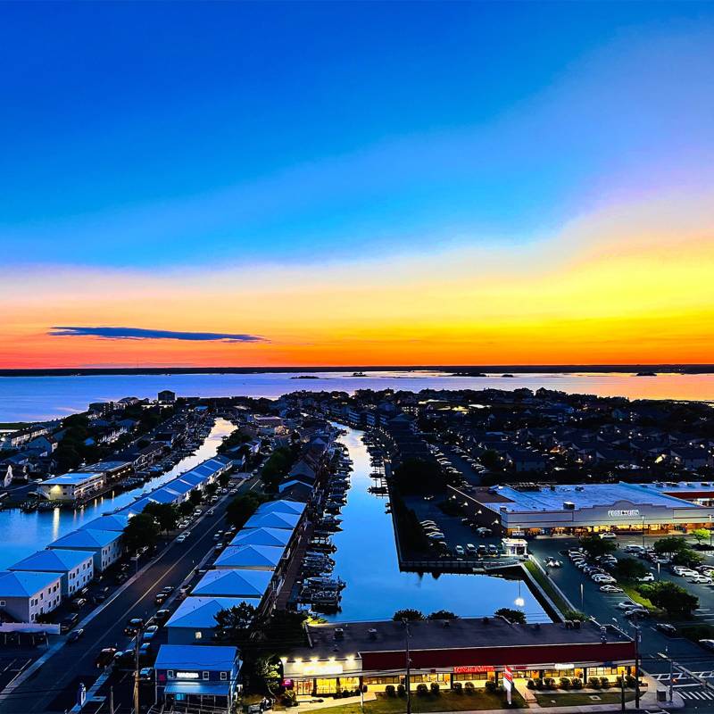 sunset over the bay in ocean city md