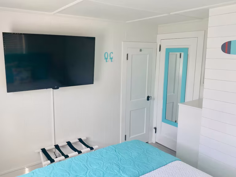 Beach Town Bungalow bedroom tv 1 768x576