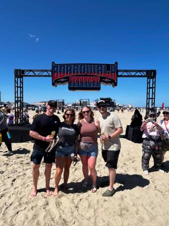 Attendees at the Boardwalk Rock arch