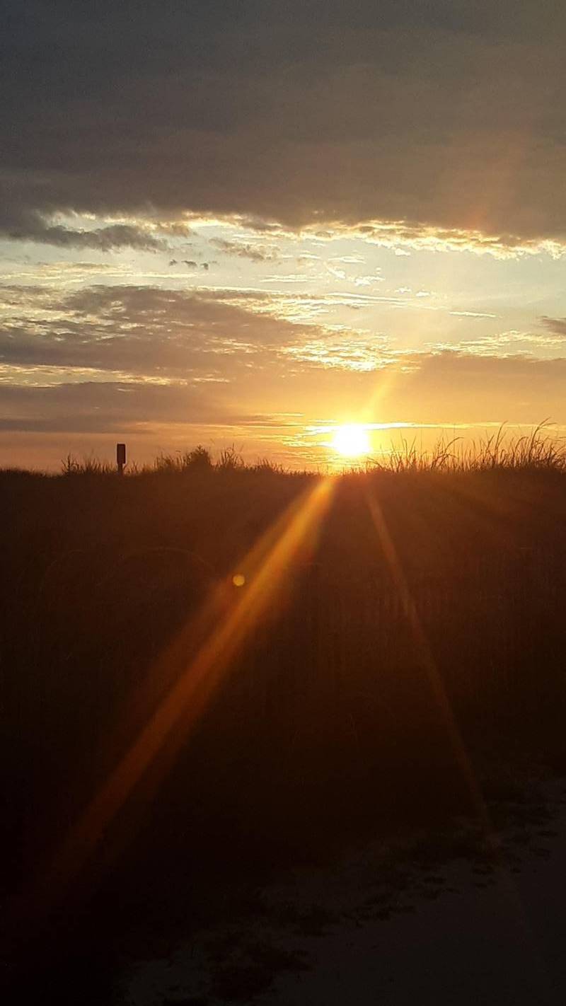 photo Friday Julie Maloney What a blessing to wake up to the sun rising over the ocean. It's the best part of the day.