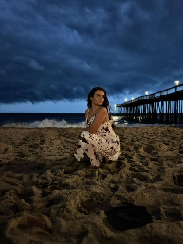 photo friday girl on beach at pier