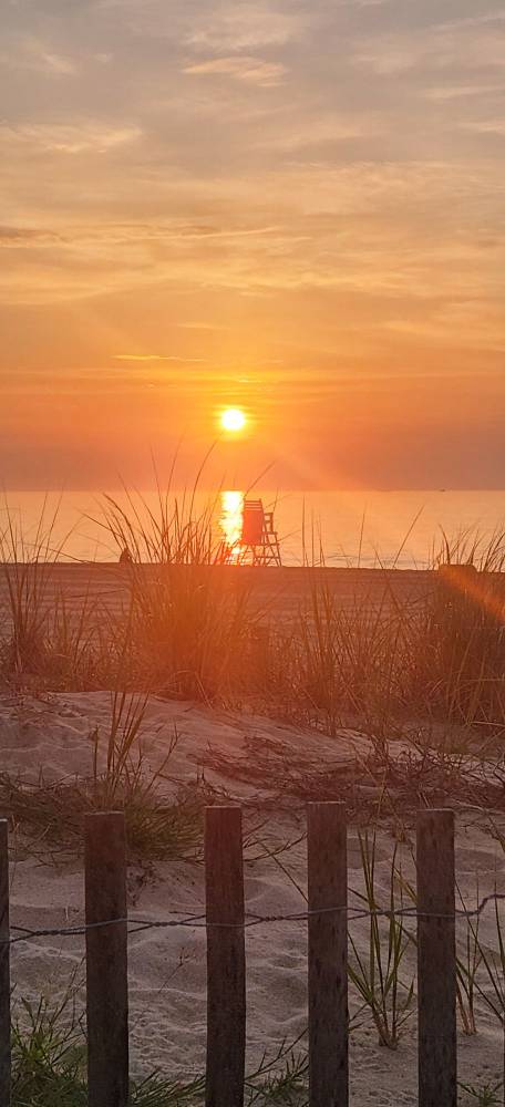 photo Friday Beth Madara My dream finally came true, I purchased a condo in Ocean City Maryland on July 18th. This was the sunrise from walking less than 300 steps to the beach to capture this beautiful creation.