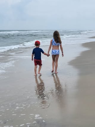 Photo Friday Jessica Brennan The beach always makes the brotherly and sisterly bond stronger. 💙 August 2025