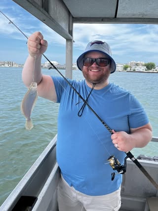 Photo Friday Nancy Radlinski Sullivan Never too old to be excited about catching a fish on an OC fishing excursion!
