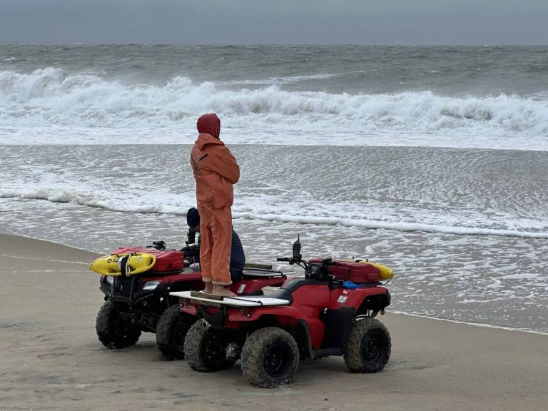OC Beach Patrol watches the waves as Hurricane Erin moved northward off the beach in Ocean Citiy
