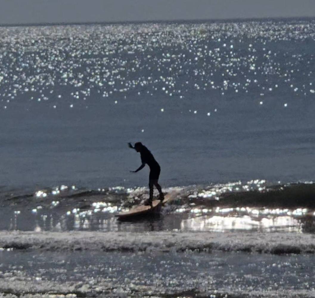 photo Friday Patricia Saiia Early Morning Surfing Lesson! What fun!