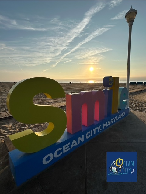 SMILE sign with sunrise