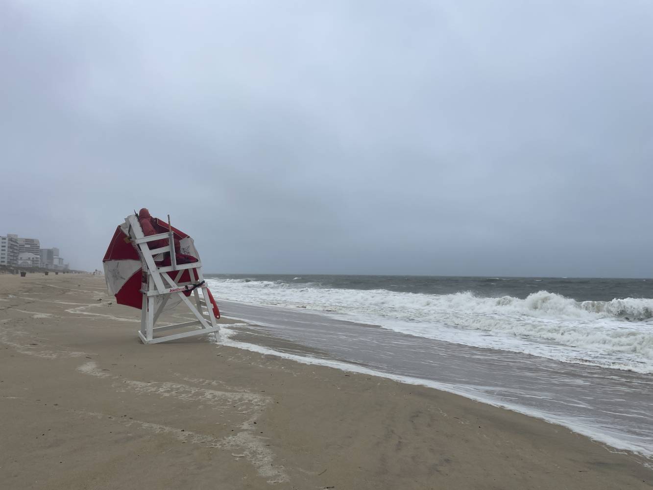 beach patrol hunkered down as beach is closed to swimming surfing and wading