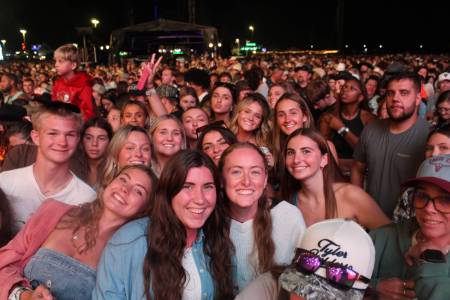 Super fans ran from the entrance gates to get their spot at noon and stayed just to get a first row spot at Country Calling.