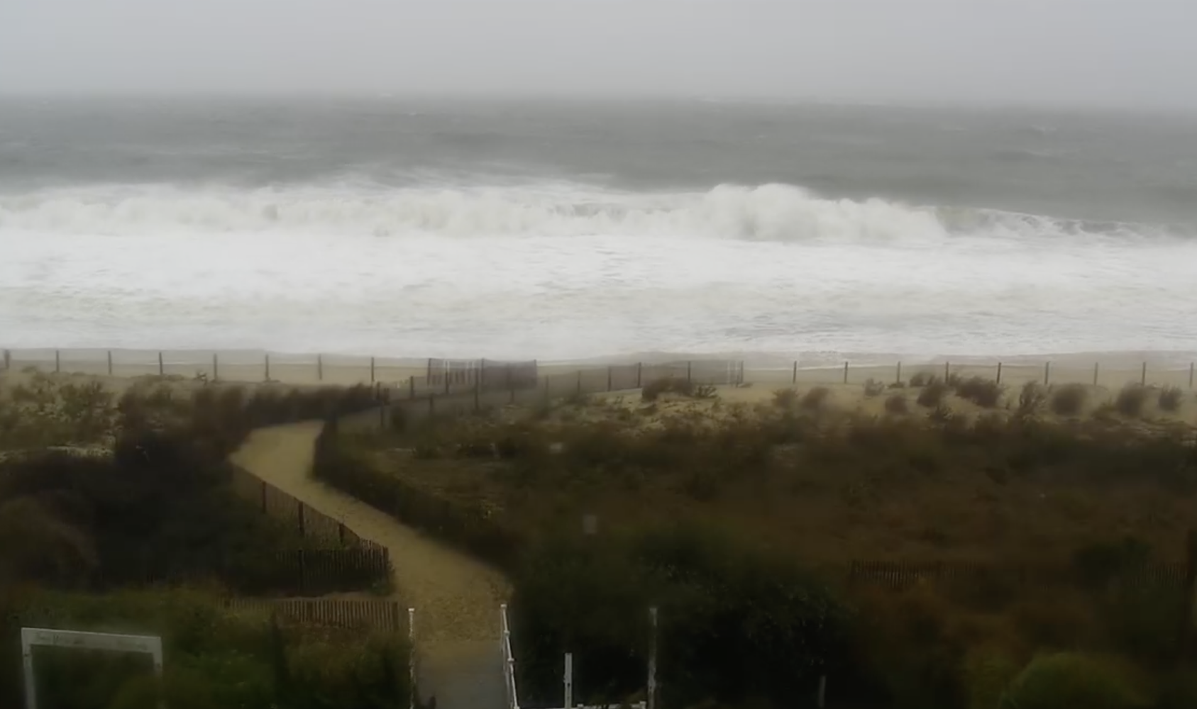 water is up to the snow fencing at the Carousel Hotel