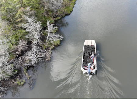 Crabbing Boat heading back to dock in Chincoteague Bay. Photo by Rolling Wave Media