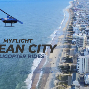 Blue helicopter flying over the ocean and beachfront city, with the overlay text: 'MYFLIGHT OCEAN CITY HELICOPTER RIDES'.